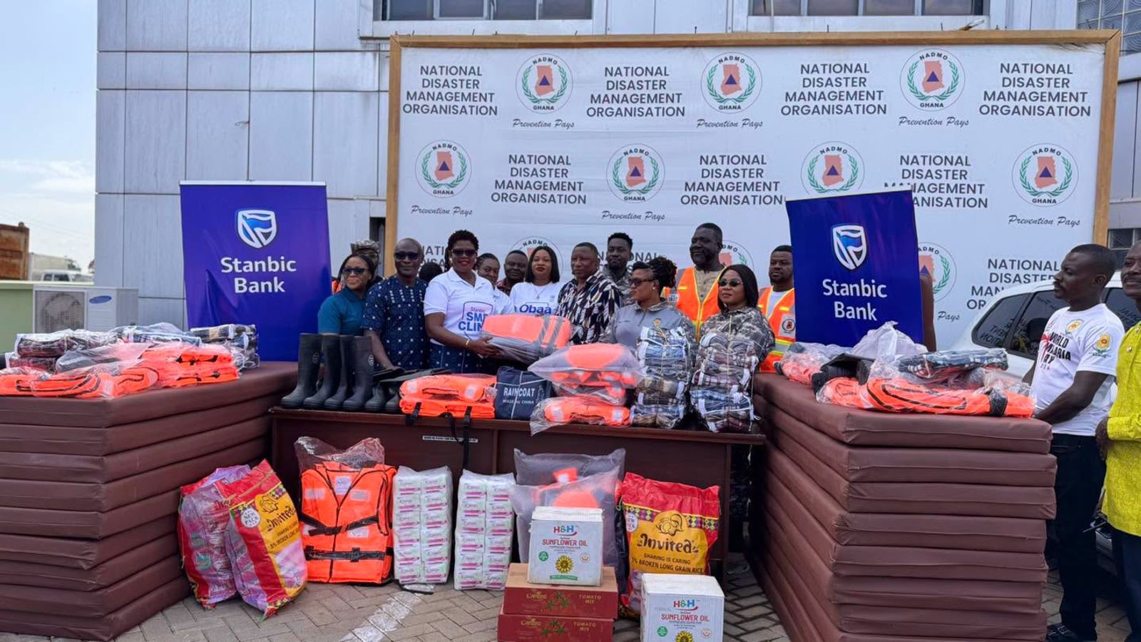 Stanbic Bank Donates GH₵400,000 in Relief Items to Support Disaster Victims Through NADMO